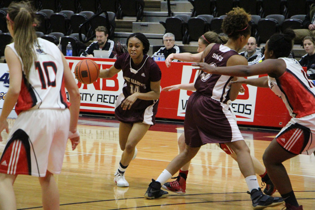 Huskies drop UNB Varsity Reds 59-52